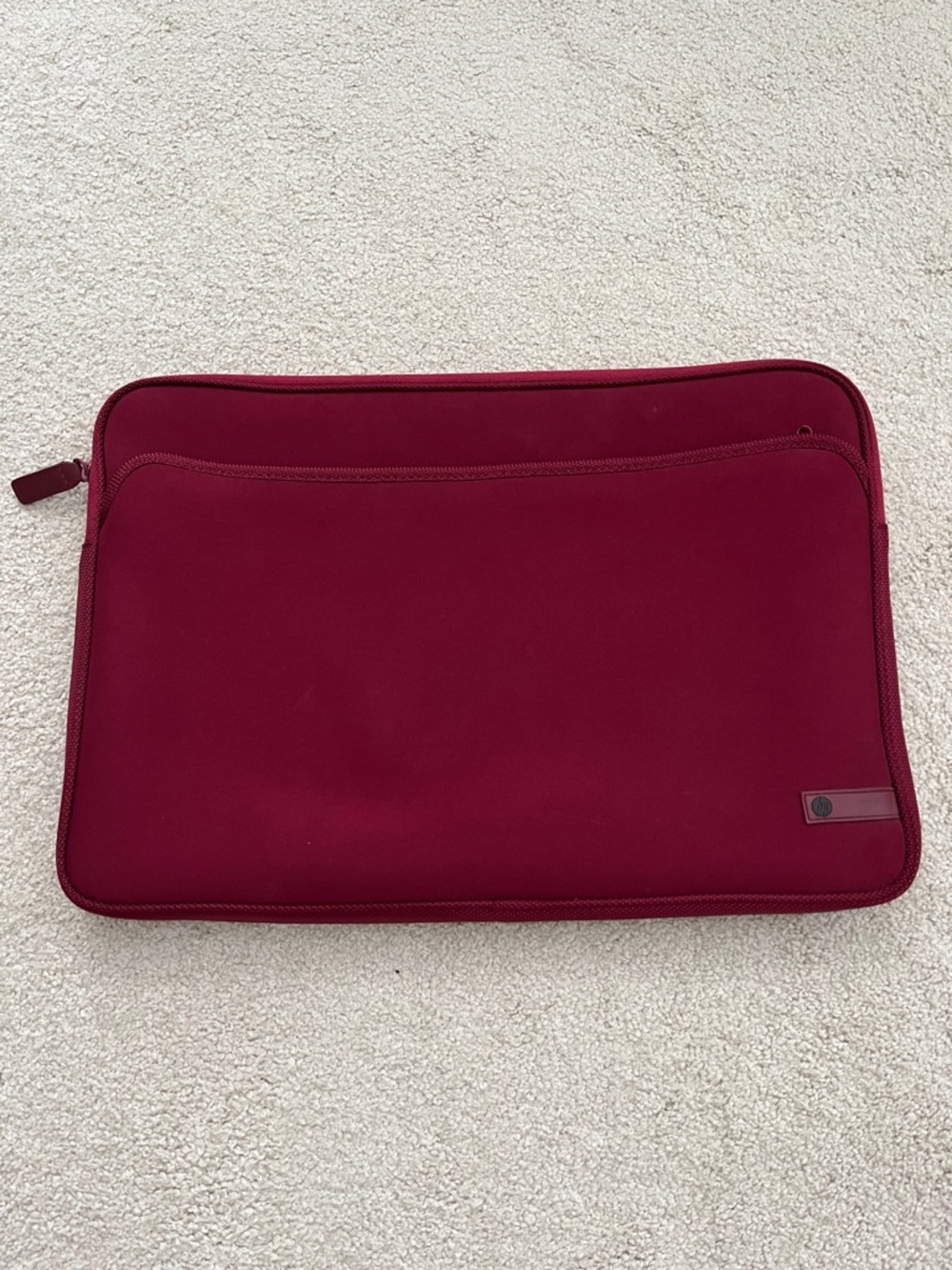 Maroon HP laptop sleeve
